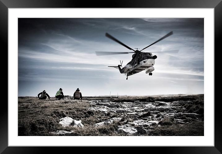 Helicopter landing Framed Mounted Print by Paul Davis
