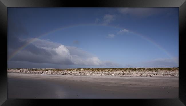 Rainbow over beach Framed Print by Paul Davis
