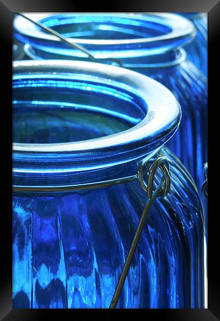 blue glass jars Framed Print by Heather Newton