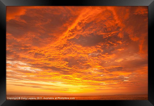Sunset over the Pacific Ocean Framed Print by Craig Lapsley