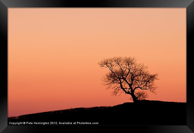 Lone tree on a hill top Framed Print by Pete Hemington