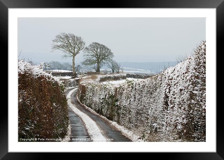 Hill top lane in snow Framed Mounted Print by Pete Hemington