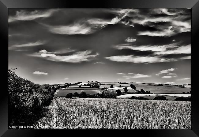 Wispy clouds over caseberry downs Framed Print by Pete Hemington