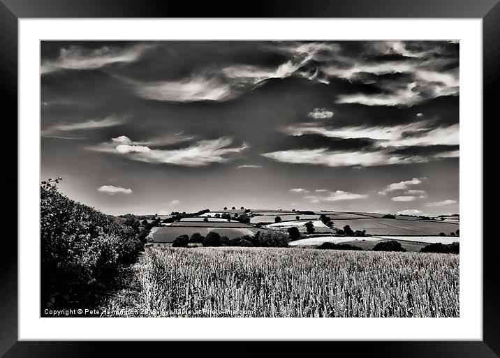 Wispy clouds over caseberry downs Framed Mounted Print by Pete Hemington