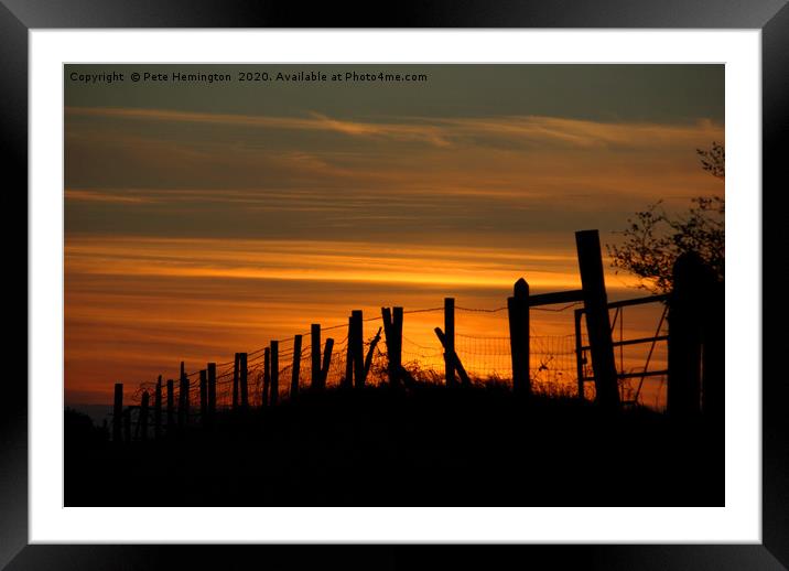 Sunset through the fence Framed Mounted Print by Pete Hemington
