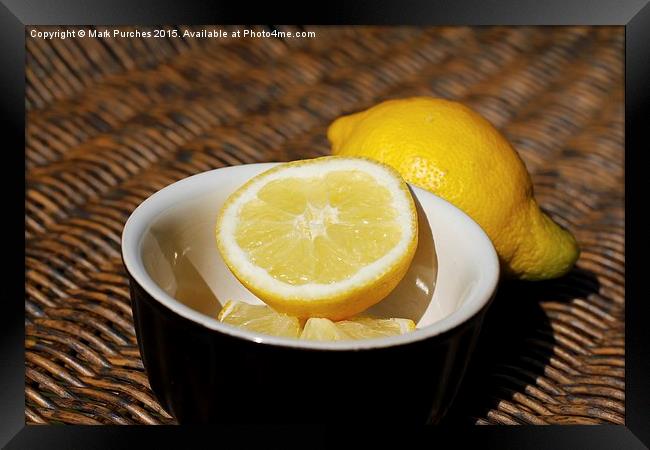 Refreshing Sliced Lemon Outdoors on Wooden Wicker  Framed Print by Mark Purches