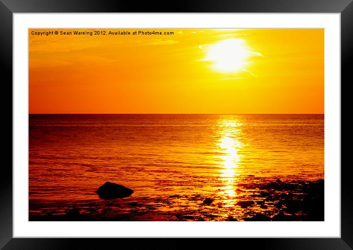 The setting sun Framed Mounted Print by Sean Wareing