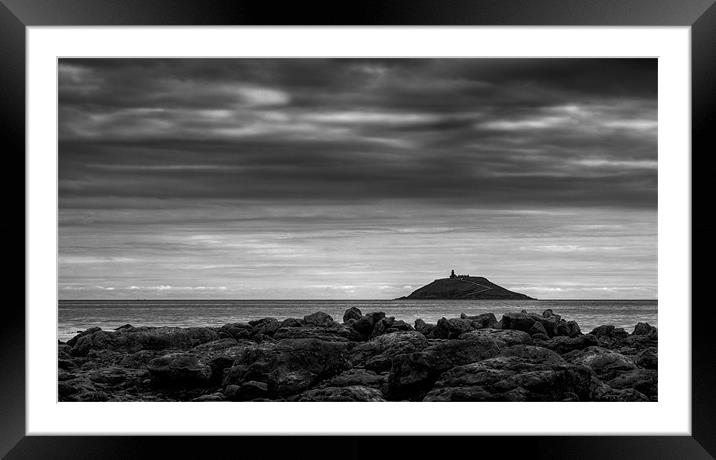 Distant Lighthouse Framed Mounted Print by Declan Howard