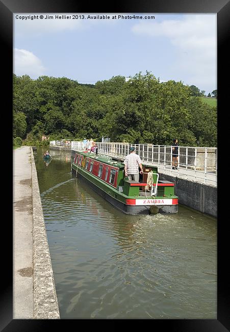 Narrowboat crossing Avoncliff aqueduct Framed Print by Jim Hellier