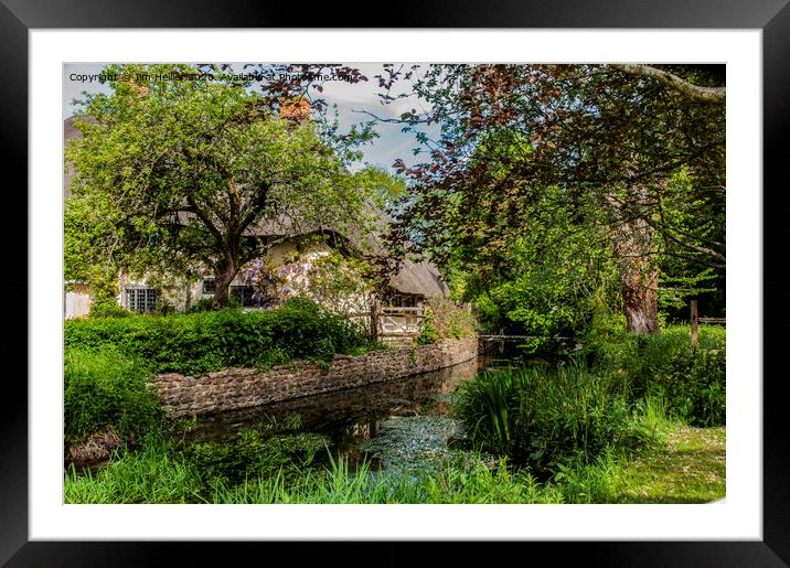 Thatched cottage by the river Lambourn  Framed Mounted Print by Jim Hellier