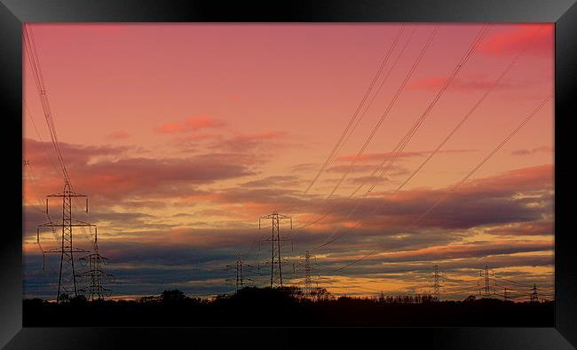 Sunset Pylons Framed Print by Louise Godwin