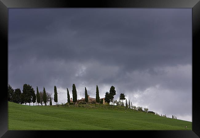 Rolling hills with storm clouds Framed Print by Thomas Schaeffer