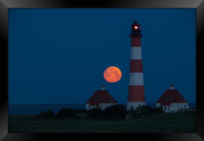 Moonset at Lighthouse in Westerhever Framed Print by Thomas Schaeffer