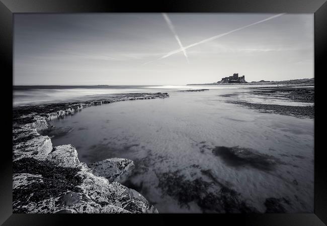Bamburgh Castle and Contrails Framed Print by Paul Appleby