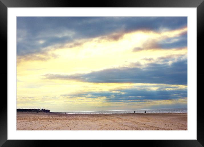 A beach scene with golden skies Framed Mounted Print by Terry Pearce