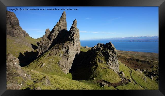 Quiraing on the Isle of Skye in Scotland. Framed Print by John Cameron