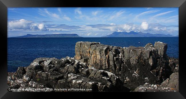 Eigg and Rum from Mallaig. Framed Print by John Cameron