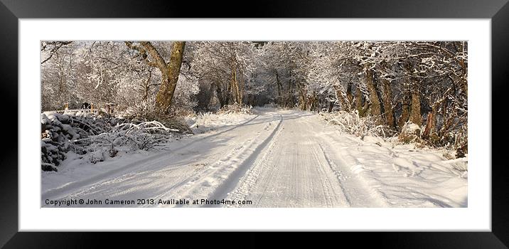 Highland road in winter. Framed Mounted Print by John Cameron