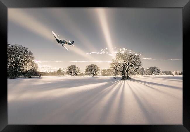 Spitfire Snow  Framed Print by J Biggadike