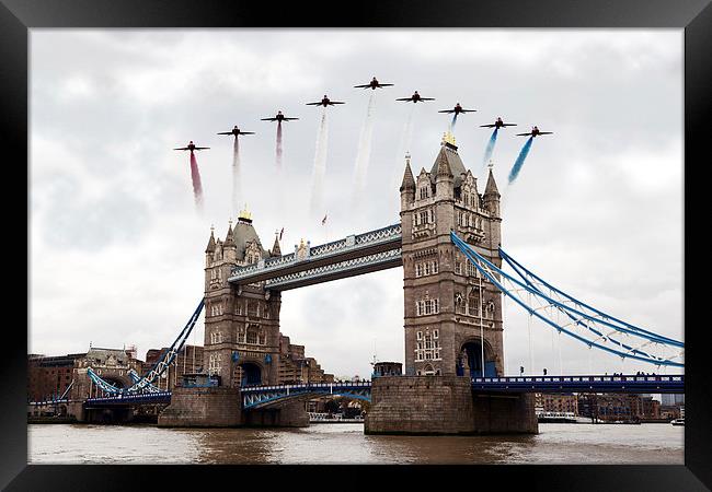 Reds over Tower Bridge Framed Print by J Biggadike