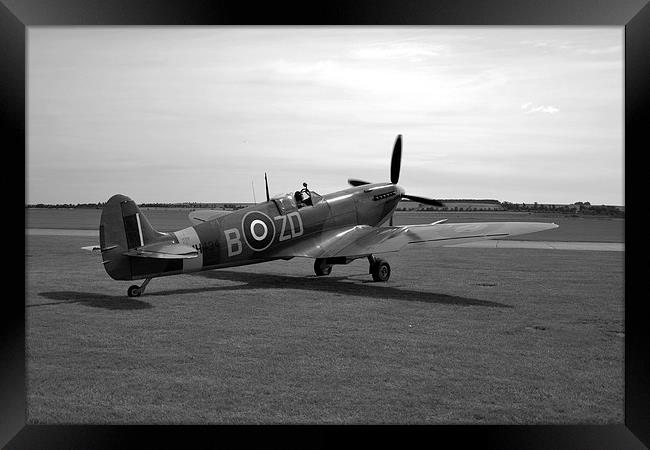 Spitfire at Duxford  Framed Print by J Biggadike