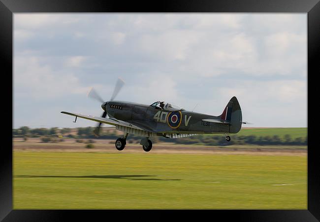 Spitfire TE311Grass Landing Framed Print by J Biggadike