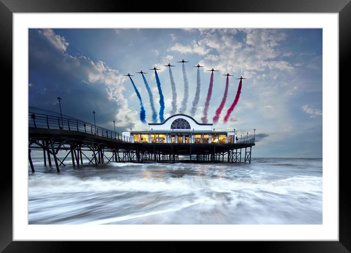 Reds Over The Pier Framed Mounted Print by J Biggadike