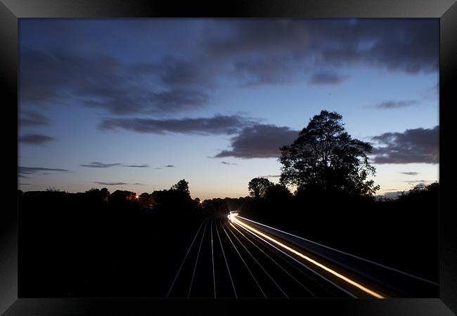 Passing Train Framed Print by J Biggadike