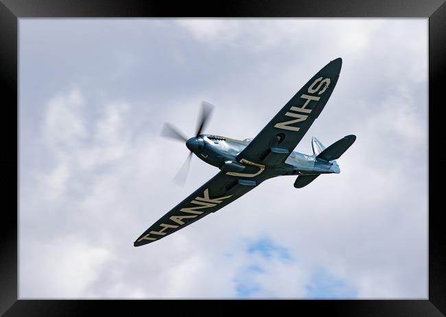 The NHS Spitfire Framed Print by J Biggadike