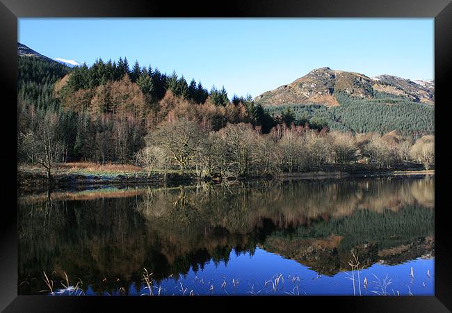 reflection on loch lubnaig Framed Print by Ann Callaghan