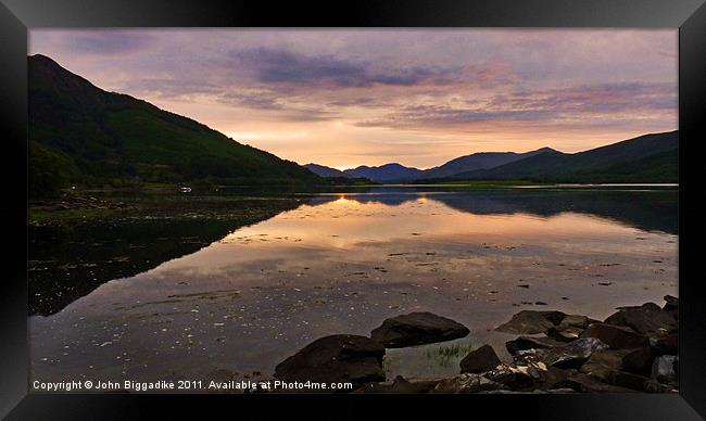 Loch Leven as the sun sets Framed Print by John Biggadike