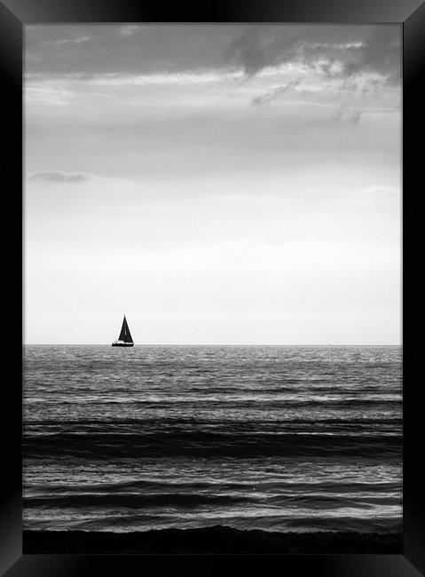 Lone Yacht Framed Print by John Biggadike