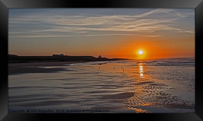 Bamburgh Sunset Framed Print by John Biggadike