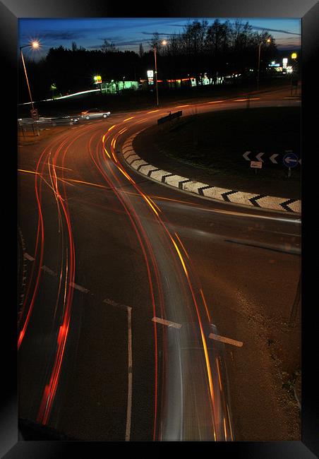 Roundabout Light Trails Framed Print by Daniel Gray