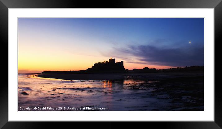 Bamburgh Castle at Sunrise Framed Mounted Print by David Pringle
