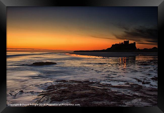 Bamburgh Castle at Sunrise Framed Print by David Pringle