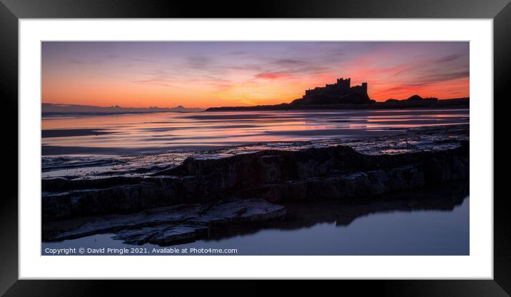 Bamburgh Castle at Sunrise Framed Mounted Print by David Pringle