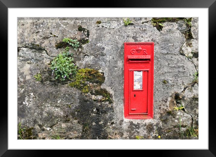 Red Post Box in a Wall Framed Mounted Print by Lynn Bolt