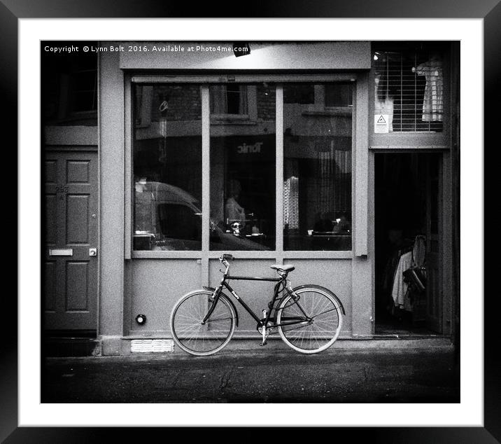 Shop Front with Bicycle Framed Mounted Print by Lynn Bolt