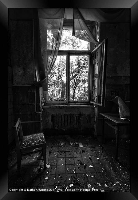 One seat in  a window Framed Print by Nathan Wright