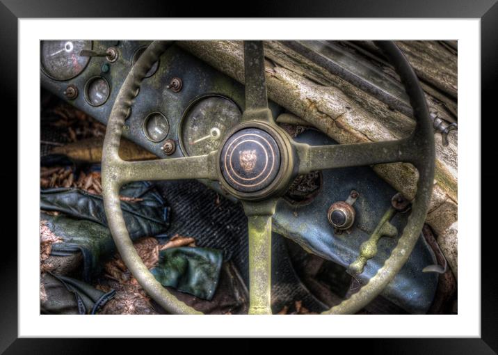 Old cat wheel Framed Mounted Print by Nathan Wright