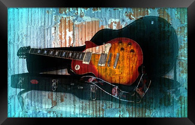 A Grungy Guitar Framed Print by Jacqui Kilcoyne
