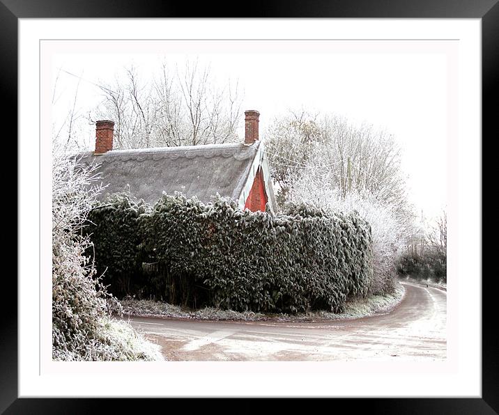 Thatched cottage after a heavy frost Framed Mounted Print by Karen Steel