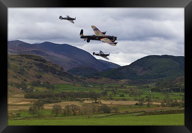 Lancaster bomber and wingmen. Framed Print by Kevin Tate