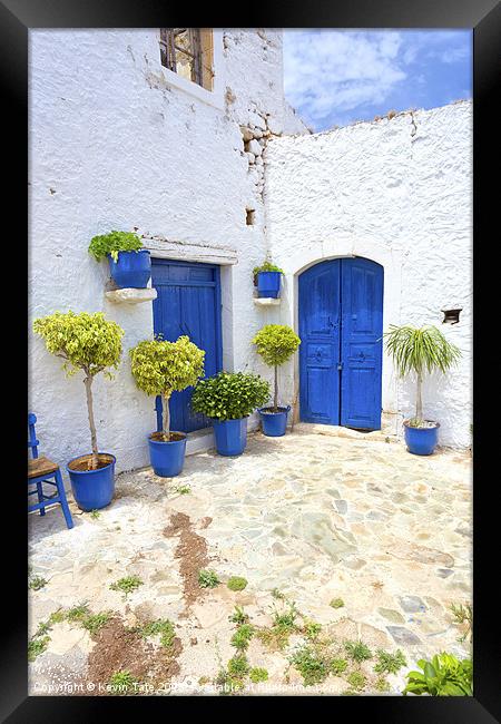 Greek courtyard Framed Print by Kevin Tate