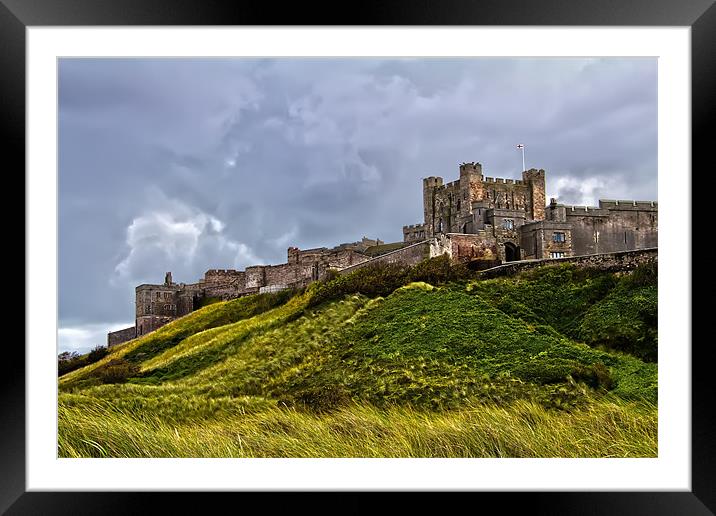 Bamburgh Castle Stormy Skies Framed Mounted Print by Northeast Images
