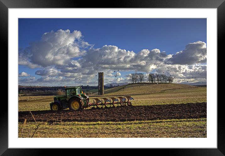 Tilling the Soil Framed Mounted Print by Tom Gomez