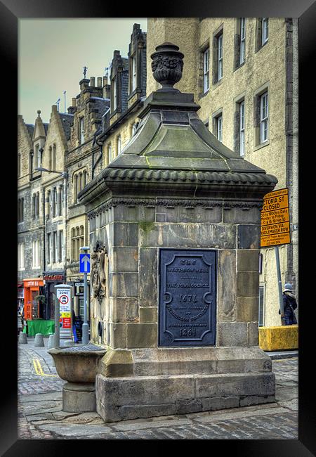 The West Bow Well Framed Print by Tom Gomez