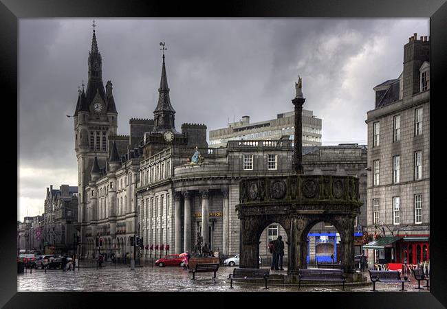 The Castlegate in the driving rain Framed Print by Tom Gomez