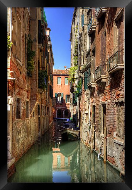 A canal in Sestiere di San Polo Framed Print by Tom Gomez